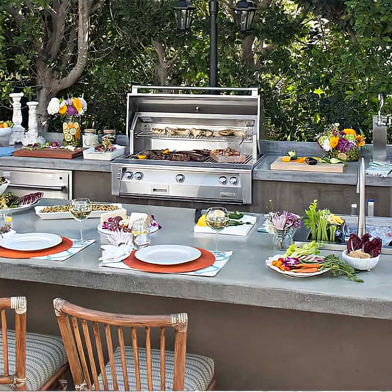 Alfresco 42-Inch Built-In Gas Grill With Sear Zone And Rotisserie With Marine Armour | Shown in Outdoor Kitchen Grilling