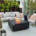 Elementi Plus Sofia Black Marble Porcelain Square Fire Table on Patio with Glass Wind Screen