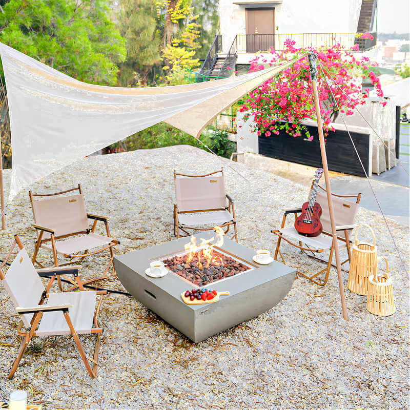 Modeno Westport Gray Concrete Square Fire Table with Beach Theme Outdoor Space