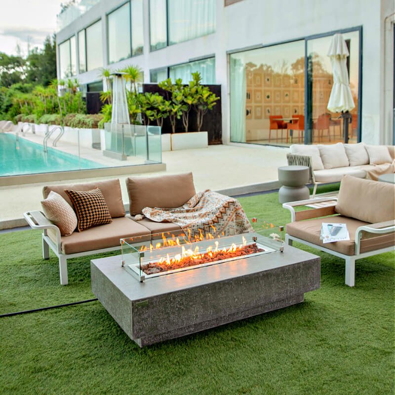 Elementi 55 Inch Hampton Rectangular Concrete Fire Table In Light Gray Outside by Pool