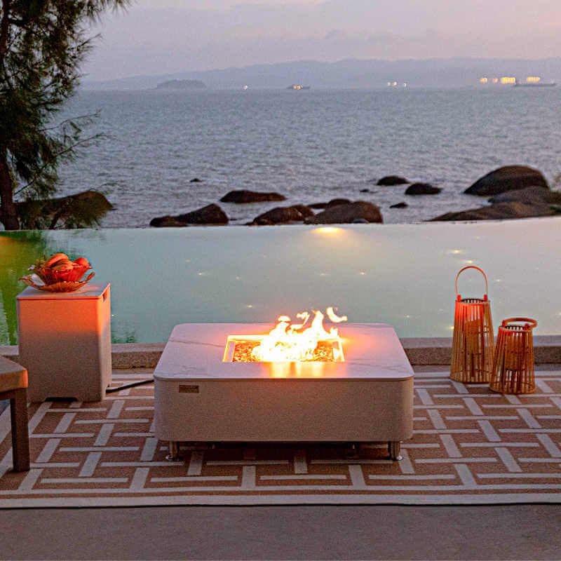 Elementi Plus Annecy Marble Porcelain Square Fire Table on Patio with Tank Cover