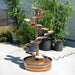 Equilibrium Copper Fountain water flowing