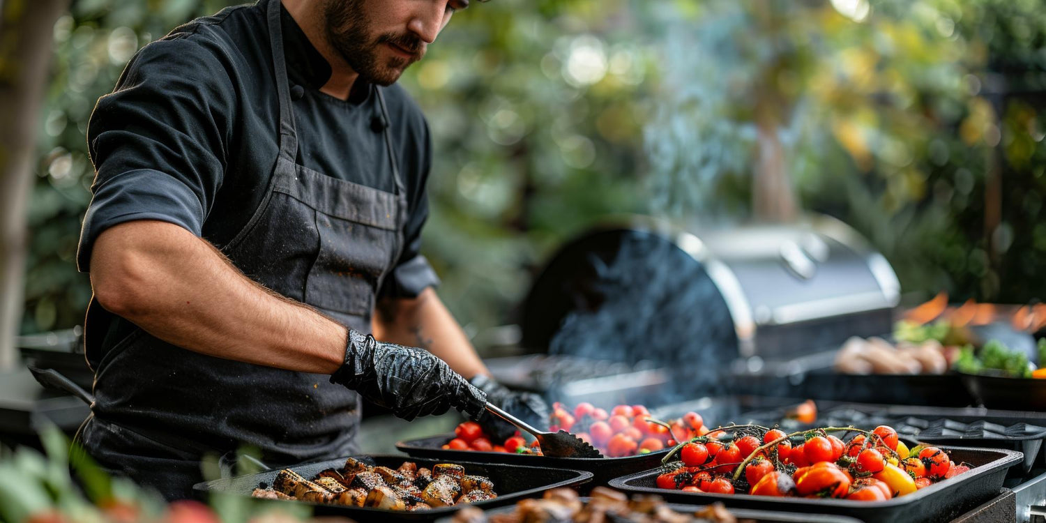  A man is outside grilling food on a grill preparing a meal
