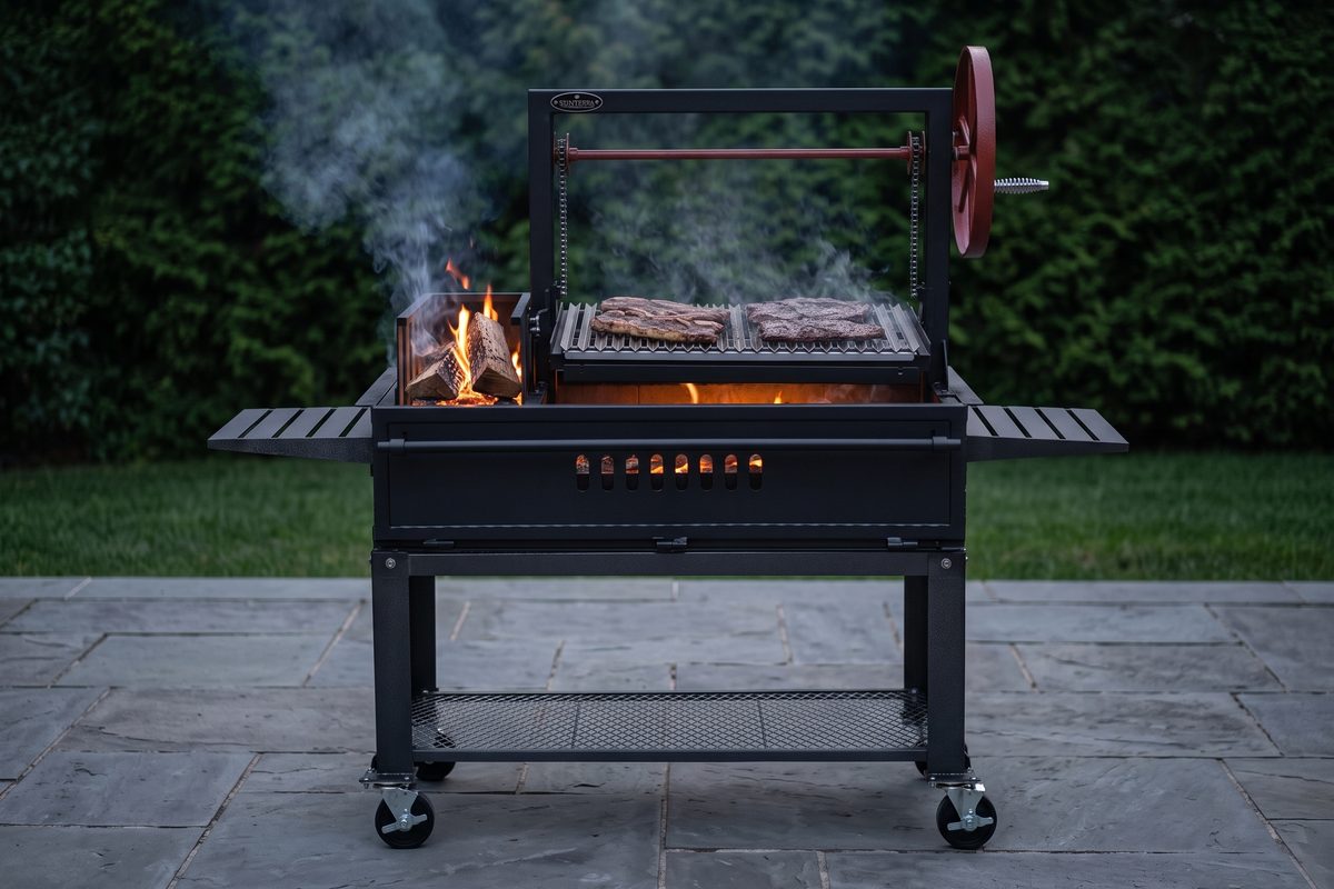 Sunterra side brasero gaucho grill cooking over oak embers on a stone patio