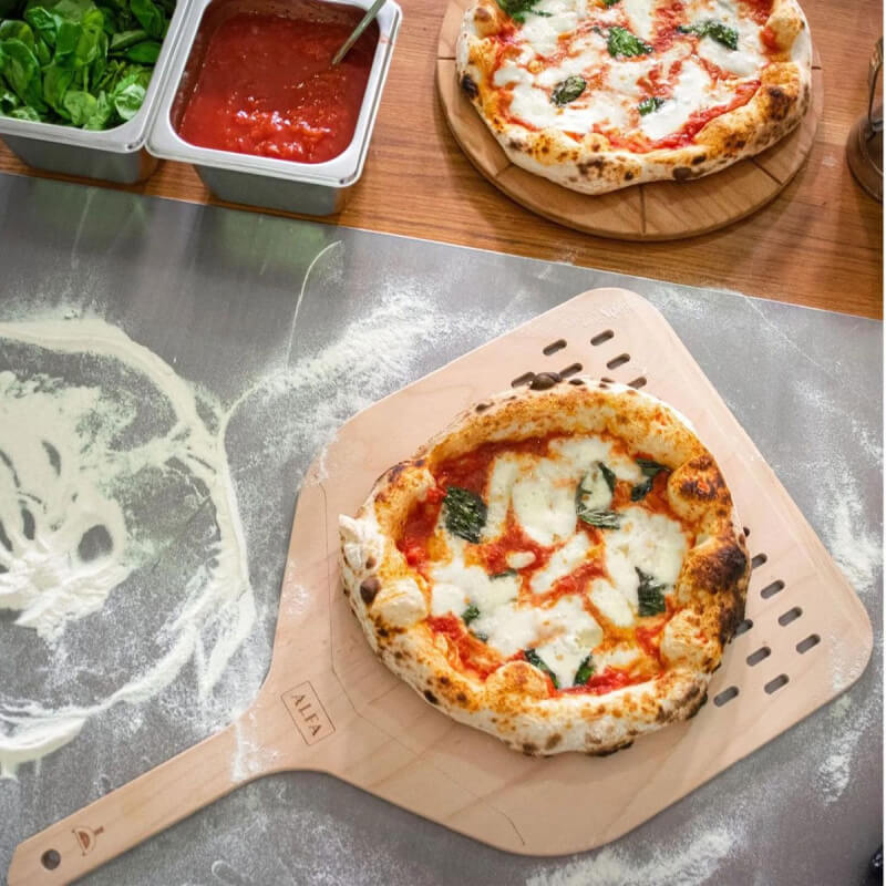 Alfa 13-Inch Wood Pizza Peel | Shown with Pizza