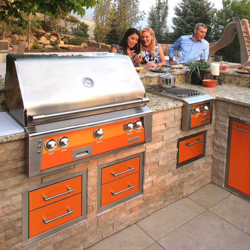 Alfresco ALXE 36-Inch Built-In Gas Grill With Rotisserie With Marine Armour | Installed in Outdoor Kitchen in Luminous Orange