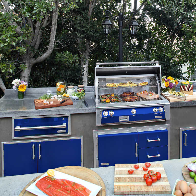 Alfresco ALXE 36-Inch Built-In Gas Grill With Rotisserie | Installed in Outdoor Kitchen in Ultramarine Blue