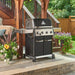 Broil King Baron 440 PRO Black 4-Burner Gas Grill | Shown on Patio