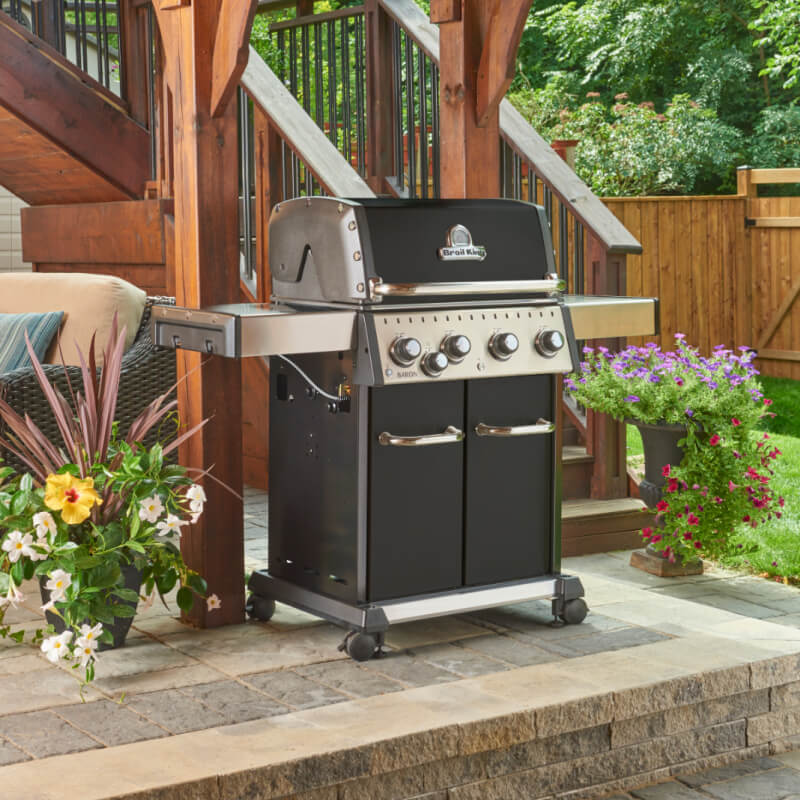 Broil King Baron 440 PRO Black 4-Burner Gas Grill | Shown on Patio