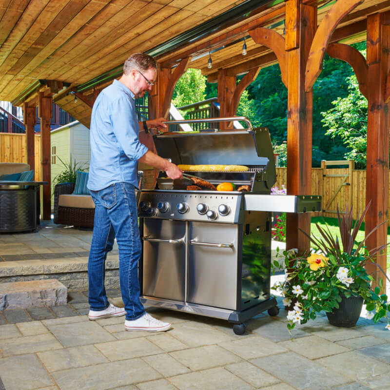 Broil King Baron S 590 PRO IR Grill | Shown Grilling on Patio