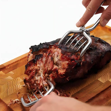 Broil King Stainless Steel Meat Claws | Shown Shredding Meat