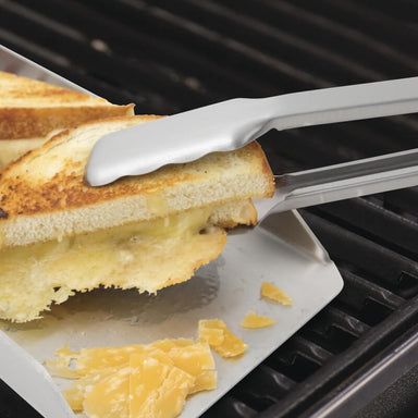 Broil King 6 X 16-Inch Stainless Steel Narrow BBQ Griddle | Shown with Grill Cheese