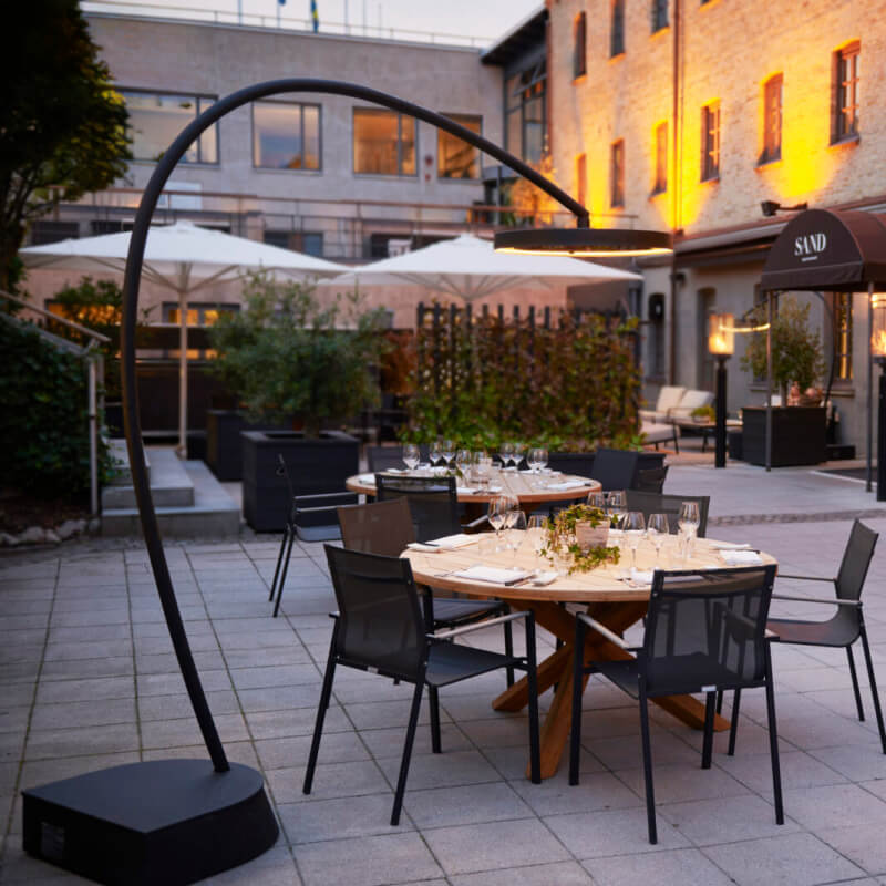 Bromic Eclipse Electric Freestanding Heater & Light | Shown At Restaurant