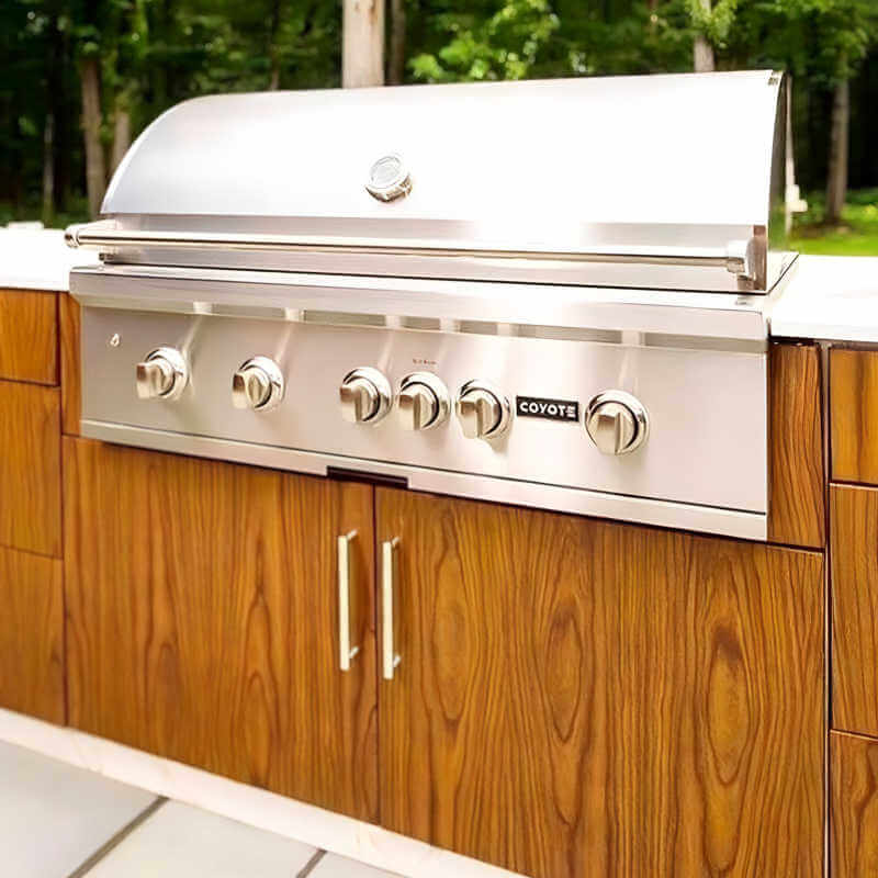 Coyote S-Series 42-Inch Built-In Gas Grill | Shown in Wood Finished Outdoor Kitchen