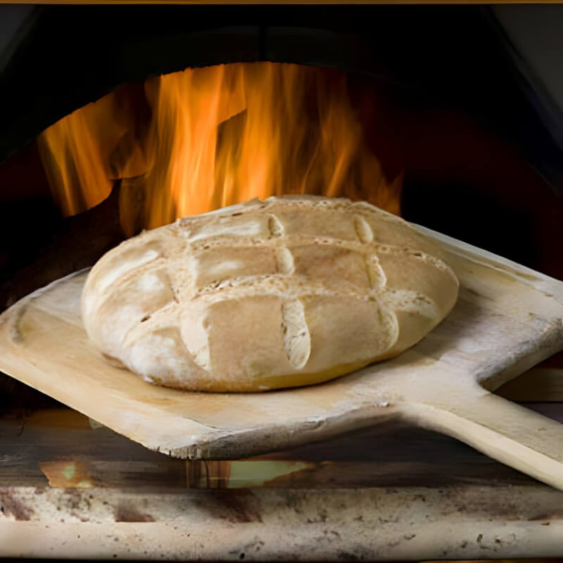 Earthstone Ovens Wood Fired Pizza Oven | Shown Cooking Bread