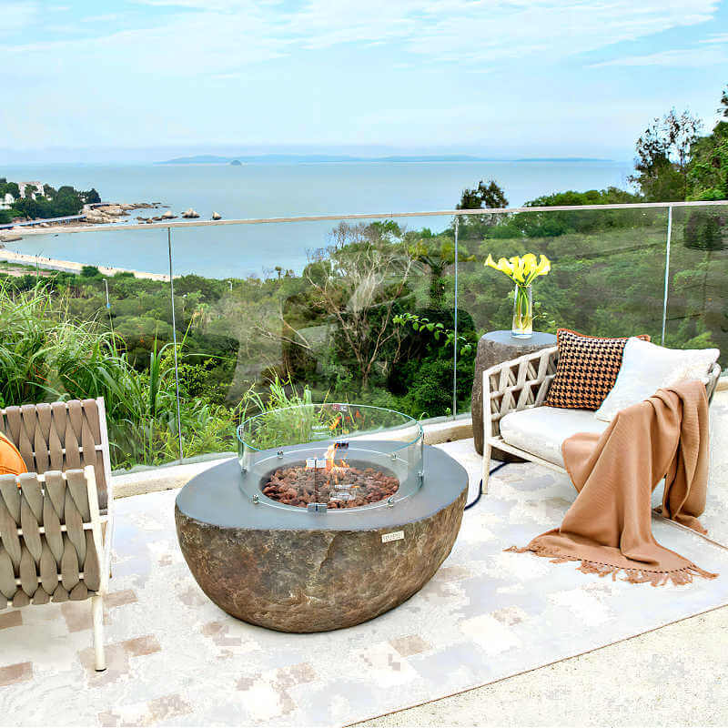 Elementi Boulder Concrete Fire Bowl | Shown with Glass Wind Screen