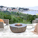 Elementi Boulder Concrete Fire Bowl on Patio