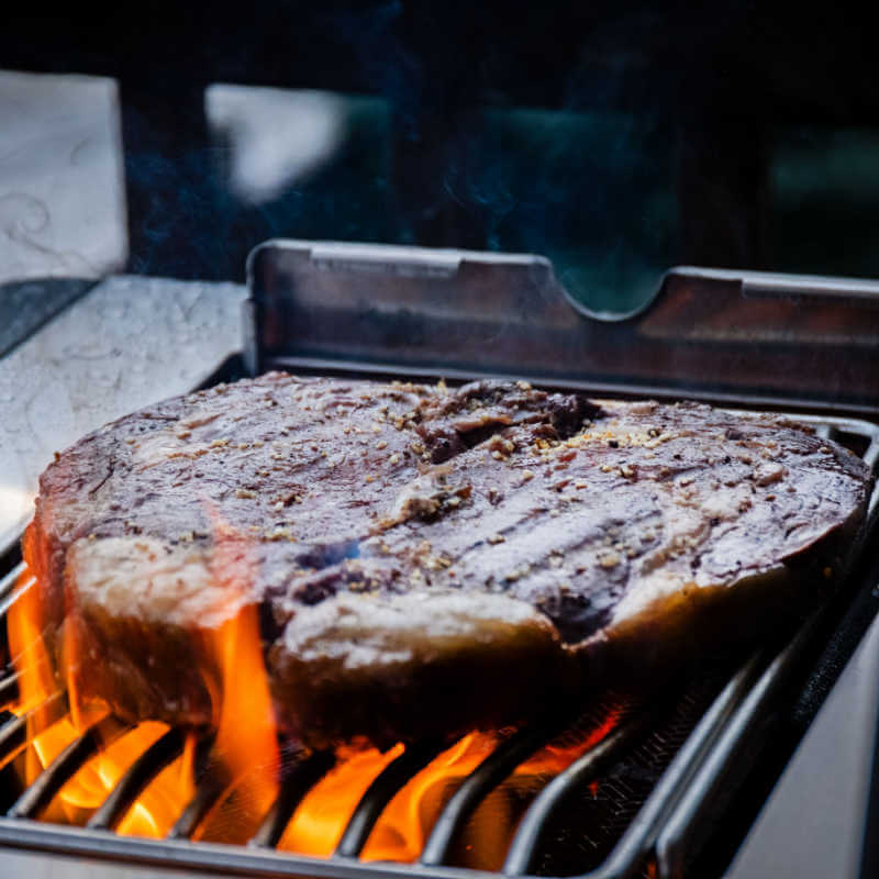 Napoleon Prestige 500 Connected 4-Burner Gas Grill | Sear Station Searing Steaks