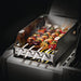 Napoleon Side Burner Windshield with Skewer Rack | Shown with Skewers