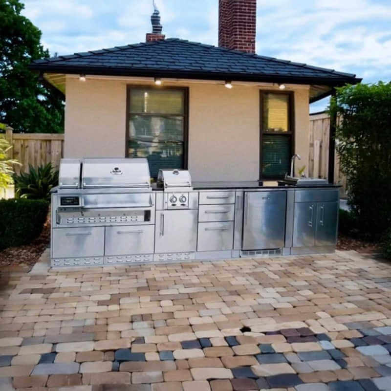 Sunstone Grills Cypress 11 1/2 Ft Outdoor Kitchen | Shown in Backyard