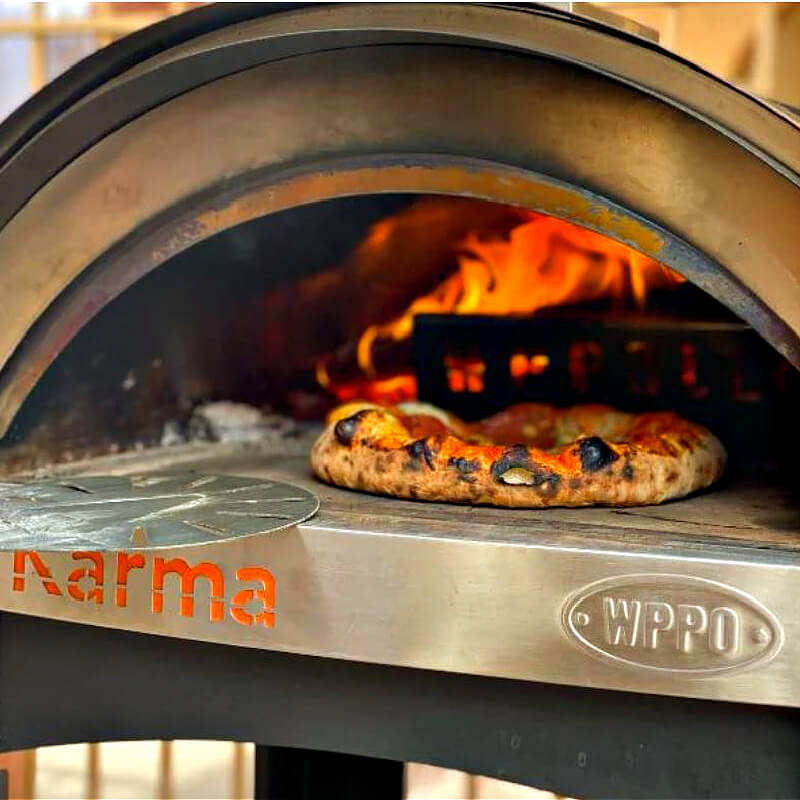 WPPO Karma 25 Inch Red Wood Fired Pizza Oven | Shown Cooking Pizza