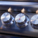 Close-up of Blaze LTE+ grill control knobs with blue LED backlighting
