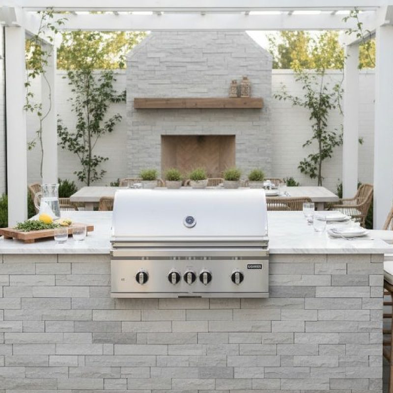 Coyote SL-Series 36-Inch 4-Burner Grill | Shown in Outdoor Kitchen