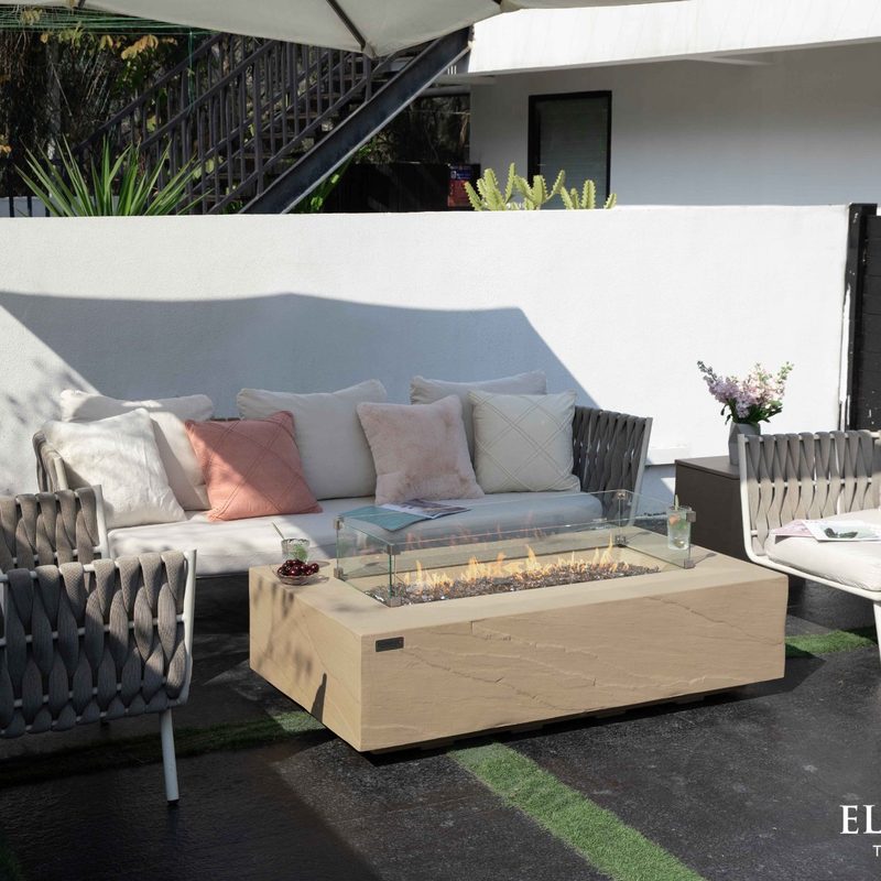 Elementi Plus Colorado Fire Table on Patio Fire Lit with Glass Wind Screen