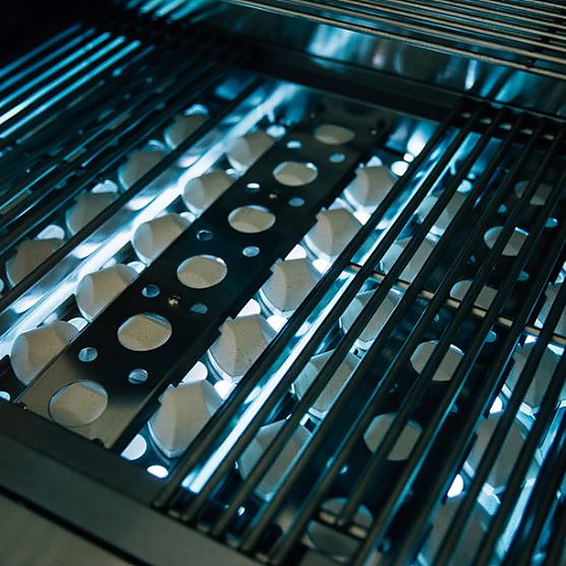 Jupiter radiant ceramic briquette system installed beneath stainless steel cooking grates