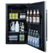 Summit SPR196OSADA 19-inch shallow-depth outdoor ADA all-refrigerator, door open, stocked with food and drinks