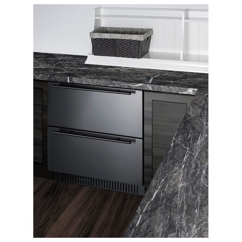 Summit SPR3032DCSSADA built into dark cabinetry beneath a marble countertop