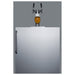 Summit SBC54OSBIADA 24-inch ADA height outdoor dual tap kegerator, twin tap tower pouring a glass of beer, closeup