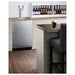 Summit SBC54OSBIADAWKDTWIN 24-inch ADA height outdoor dual tap wine dispenser, built into a bar with wine bottles overhead, lifestyle view