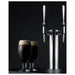 Summit SBC682PNRNCFTWIN 24-inch panel-ready dual tap nitro cold brew coffee kegerator, glasses of nitro cold brew coffee beside the twin tower, detail view