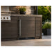 Summit SPR627OSPNR 24-inch outdoor panel-ready all-refrigerator, installed in outdoor kitchen, lifestyle