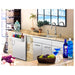 Summit SPR7BOSSTSR 24-inch outdoor all-stainless refrigerator with speed rail, installed in outdoor bar, lifestyle view