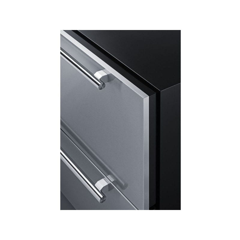 Close-up of the stainless steel drawer fronts and handles on the Summit SPR36DROS outdoor refrigerator.