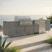 WeatherStrong 126 inch Breakwater outdoor kitchen island Miami Dark Ash on a coastal patio