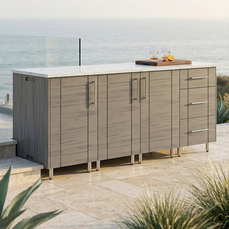 WeatherStrong 74 inch Lagoon outdoor kitchen island Sanibel Dark Ash on a coastal patio