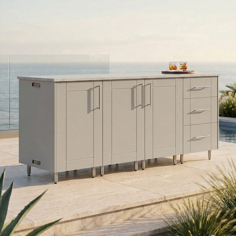 WeatherStrong 74 inch Lagoon outdoor kitchen island Sanibel Shoreline Gray on a coastal patio
