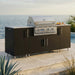 WeatherStrong 86 inch Sandbar outdoor kitchen island Miami Pitch Black on a coastal patio