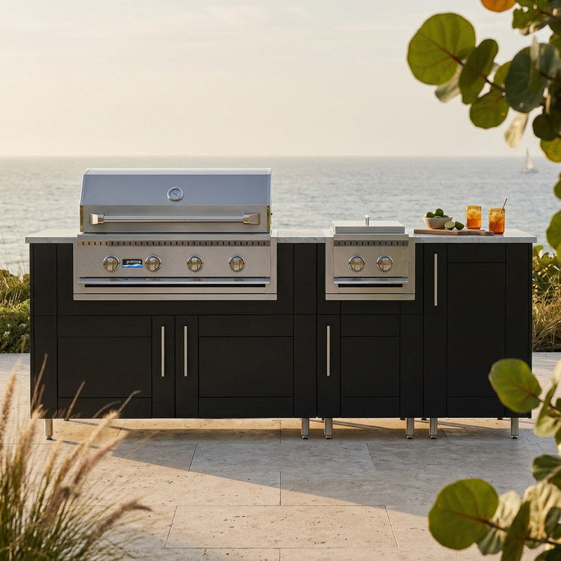 WeatherStrong 86 inch Sandbar island with side burner Sanibel Pitch Black on a coastal patio