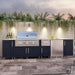 WeatherStrong Nassau Sapphire Blue outdoor kitchen island with Blaze grill, side burner and refrigerator on a patio