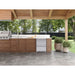 Zephyr Presrv dual drawer refrigerator built into a covered patio outdoor kitchen beside a built in gas grill.