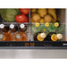 Zephyr Presrv dual drawer refrigerator stocked with produce and bottles, dual zone display shown in amber.