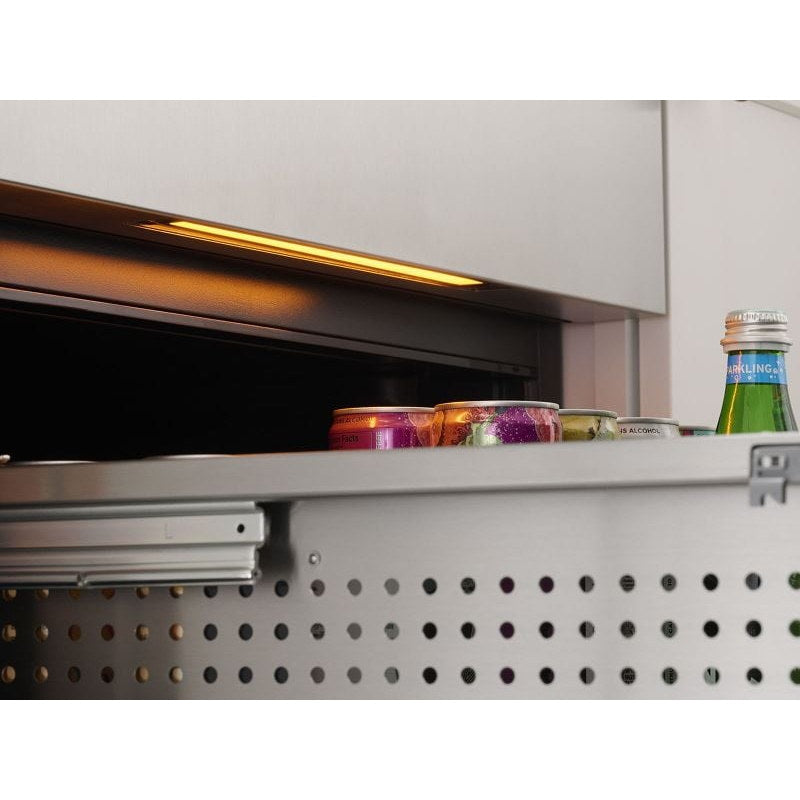 Zephyr Presrv dual drawer refrigerator interior LED strip set to Amber above jars and bottles on the drawer rail.