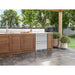 Zephyr Presrv dual drawer refrigerator in stainless steel built into a wood outdoor kitchen island on a patio.