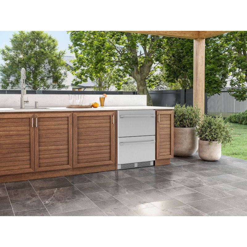 Zephyr Presrv dual drawer refrigerator in stainless steel built into a wood outdoor kitchen island on a patio.
