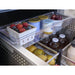 Close-up of the upper drawer of the Zephyr Presrv dual drawer refrigerator holding berries, dairy tubs and bottled drinks.