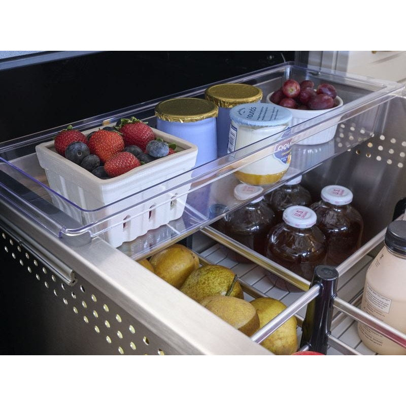 Close-up of the upper drawer of the Zephyr Presrv dual drawer refrigerator holding berries, dairy tubs and bottled drinks.